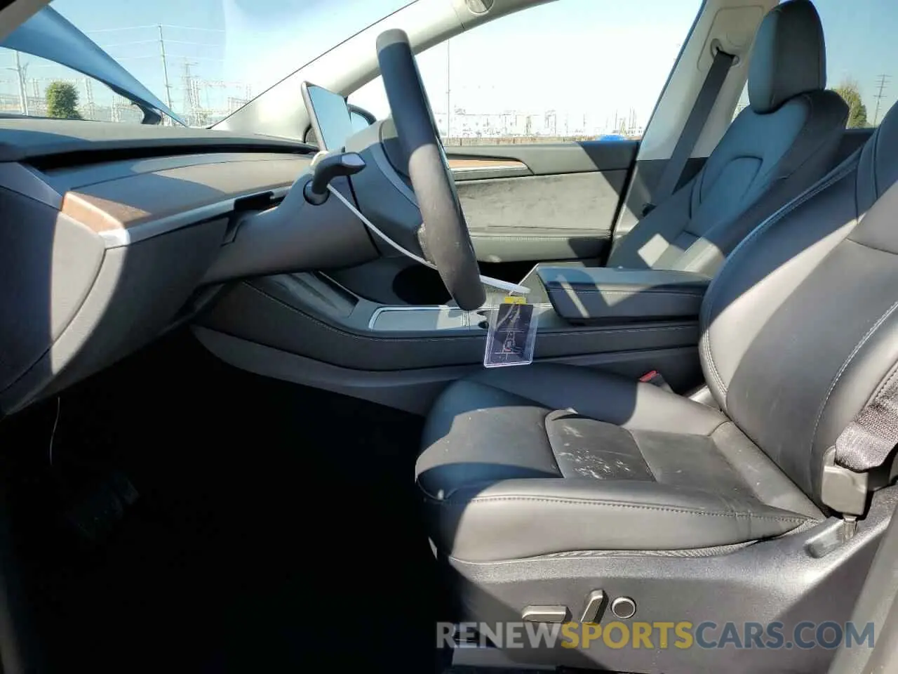 7 Photograph of a damaged car 7SAYGDED4RF113579 TESLA MODEL Y 2024