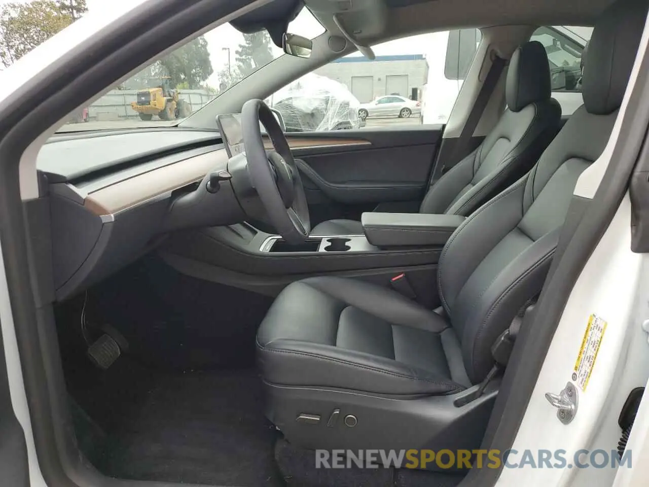 7 Photograph of a damaged car 7SAYGDED4RF118247 TESLA MODEL Y 2024