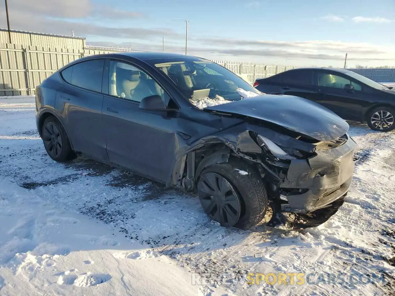 4 Photograph of a damaged car 7SAYGDED5RF016181 TESLA MODEL Y 2024