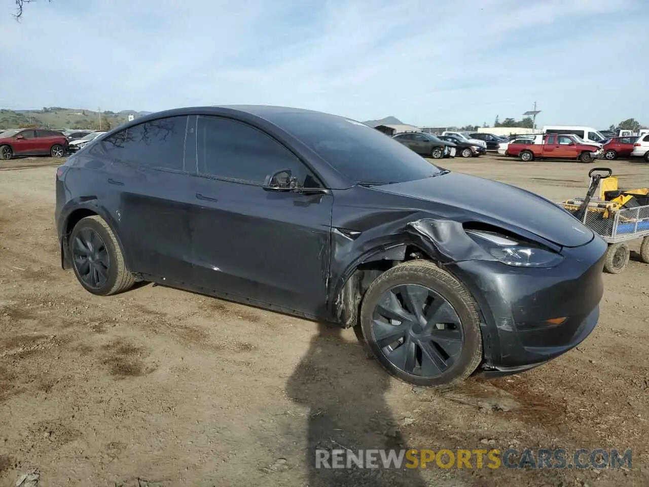 4 Photograph of a damaged car 7SAYGDED5RF105278 TESLA MODEL Y 2024