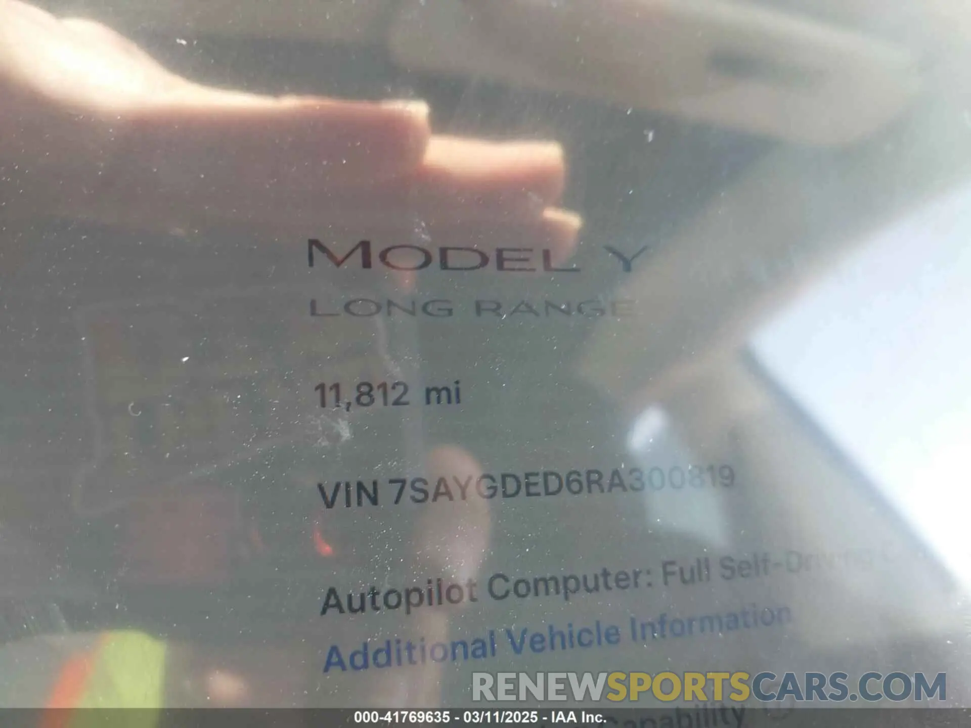 7 Photograph of a damaged car 7SAYGDED6RA300819 TESLA MODEL Y 2024