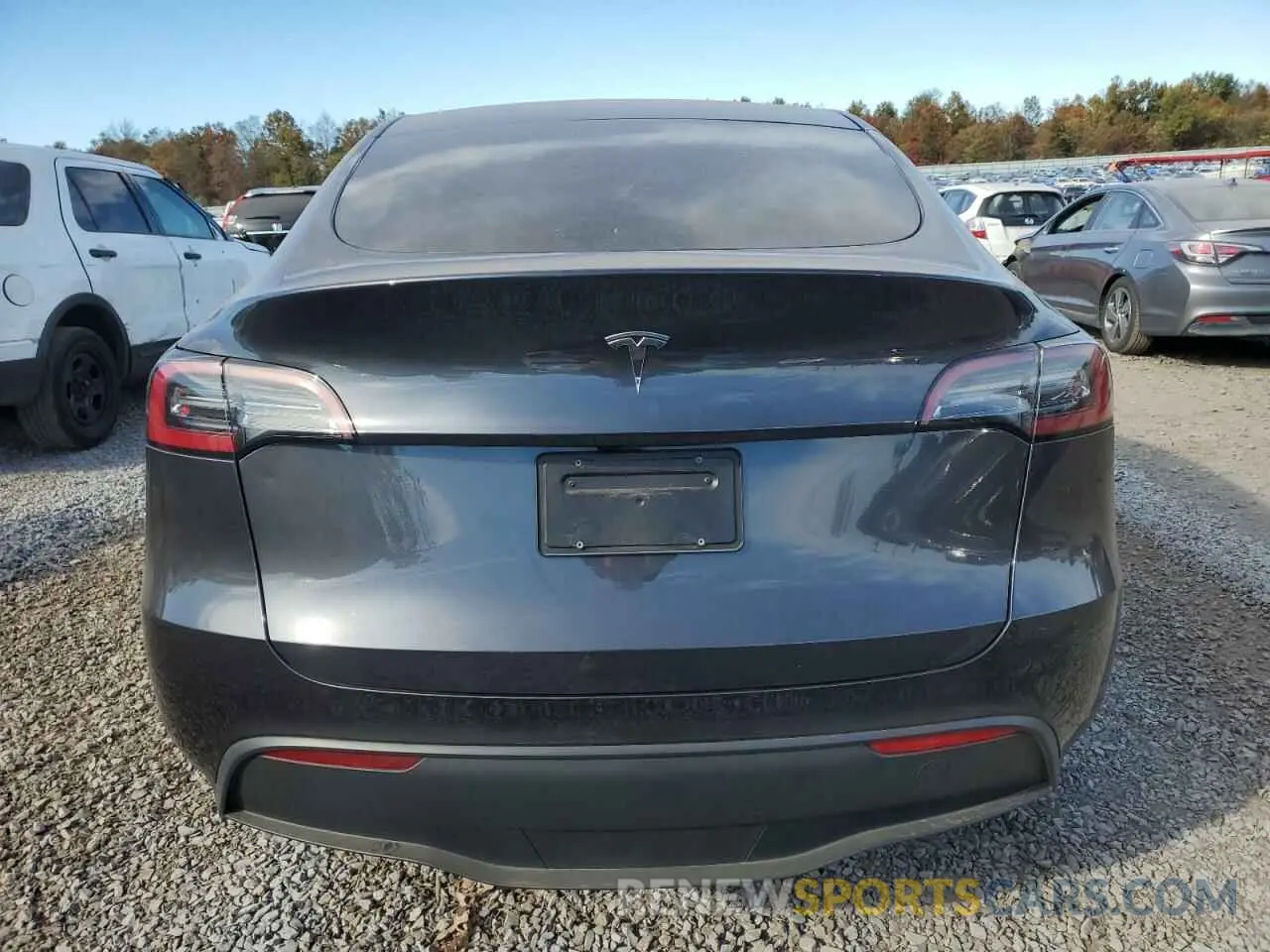 6 Photograph of a damaged car 7SAYGDED6RF004718 TESLA MODEL Y 2024
