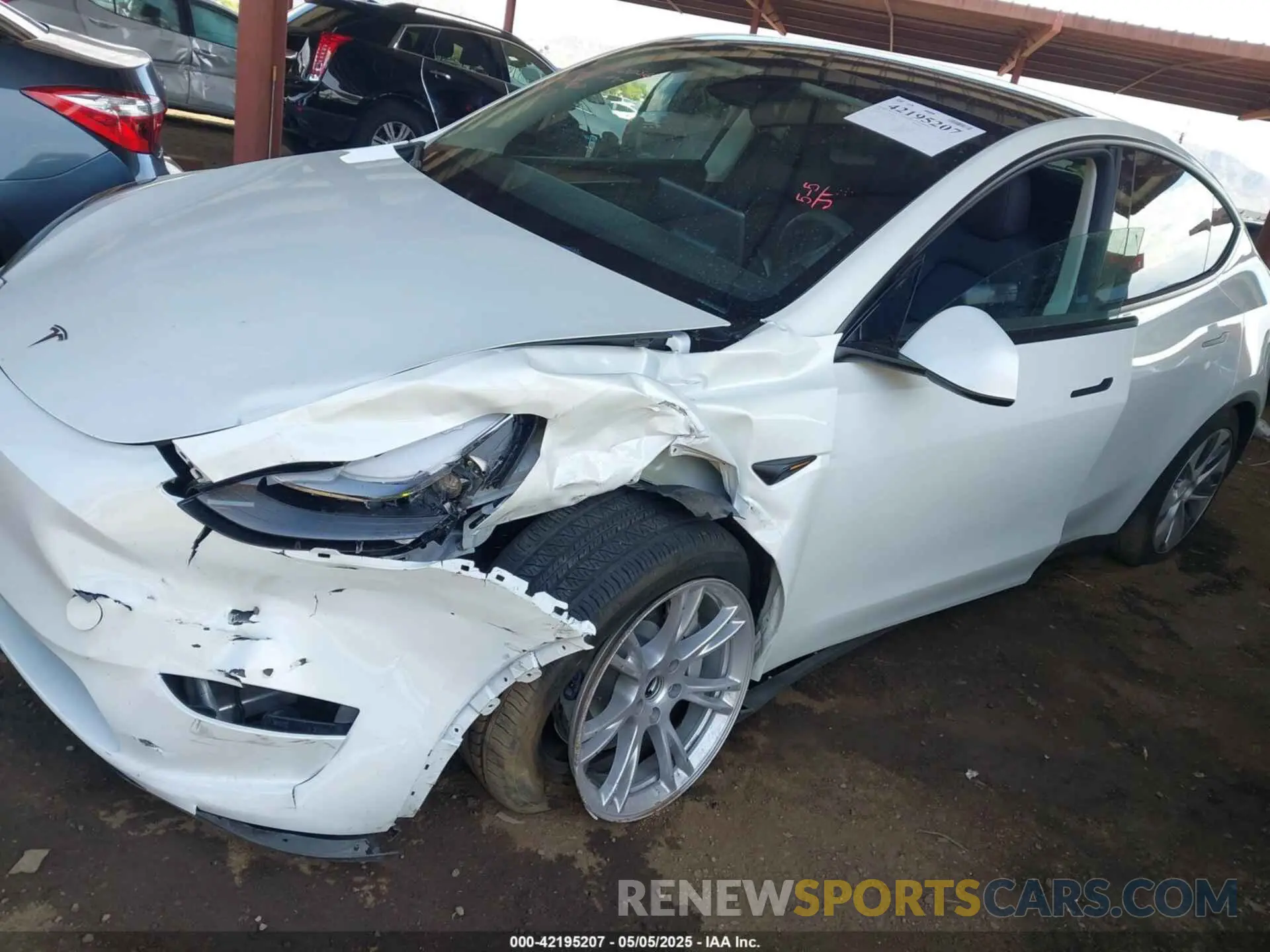 6 Photograph of a damaged car 7SAYGDED6RF056253 TESLA MODEL Y 2024