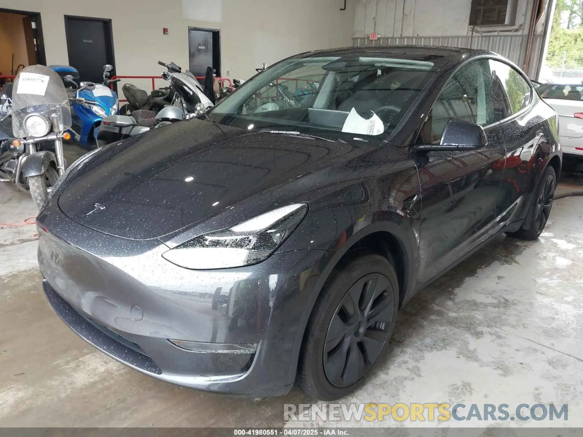 2 Photograph of a damaged car 7SAYGDED6RF103250 TESLA MODEL Y 2024