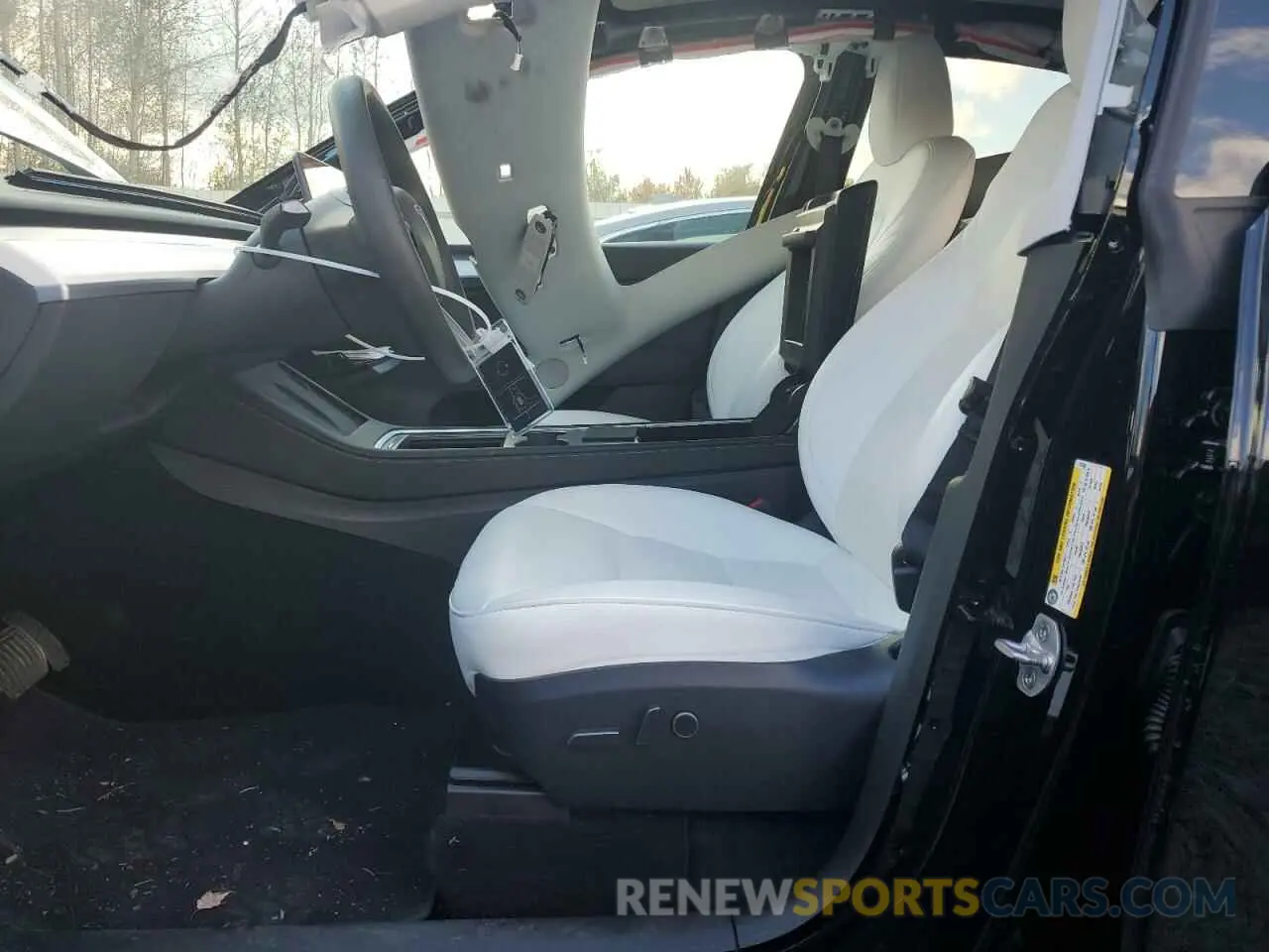 7 Photograph of a damaged car 7SAYGDED6RF127502 TESLA MODEL Y 2024
