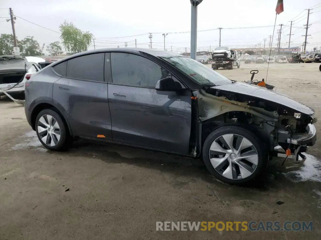 4 Photograph of a damaged car 7SAYGDED7RF042278 TESLA MODEL Y 2024