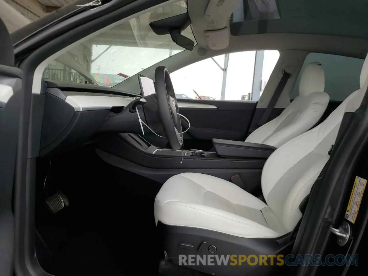 7 Photograph of a damaged car 7SAYGDED7RF042278 TESLA MODEL Y 2024