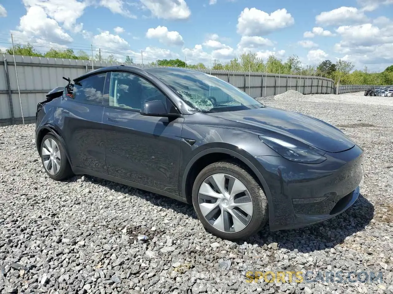 4 Photograph of a damaged car 7SAYGDED7RF042491 TESLA MODEL Y 2024