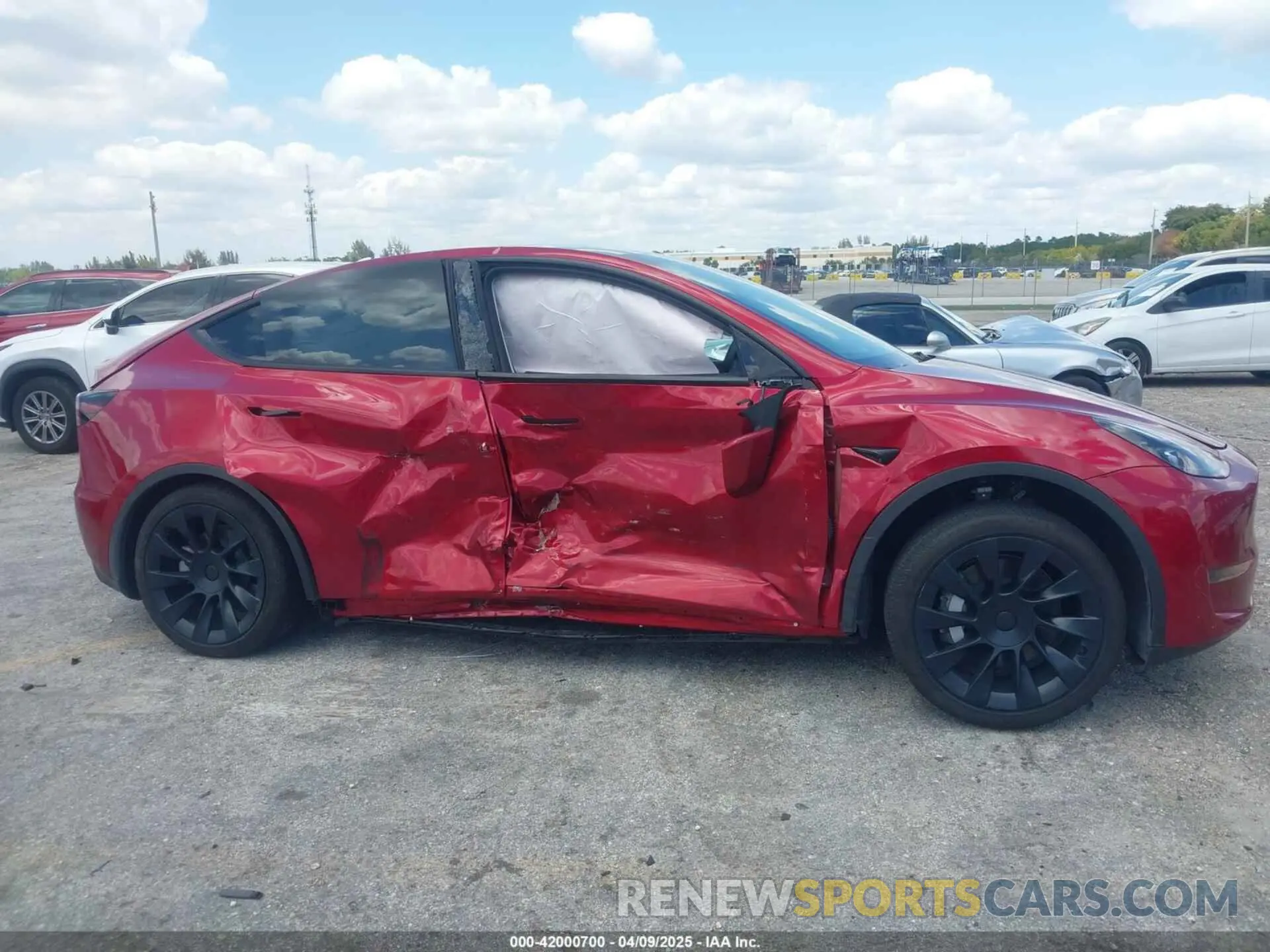 13 Photograph of a damaged car 7SAYGDED7RF045410 TESLA MODEL Y 2024