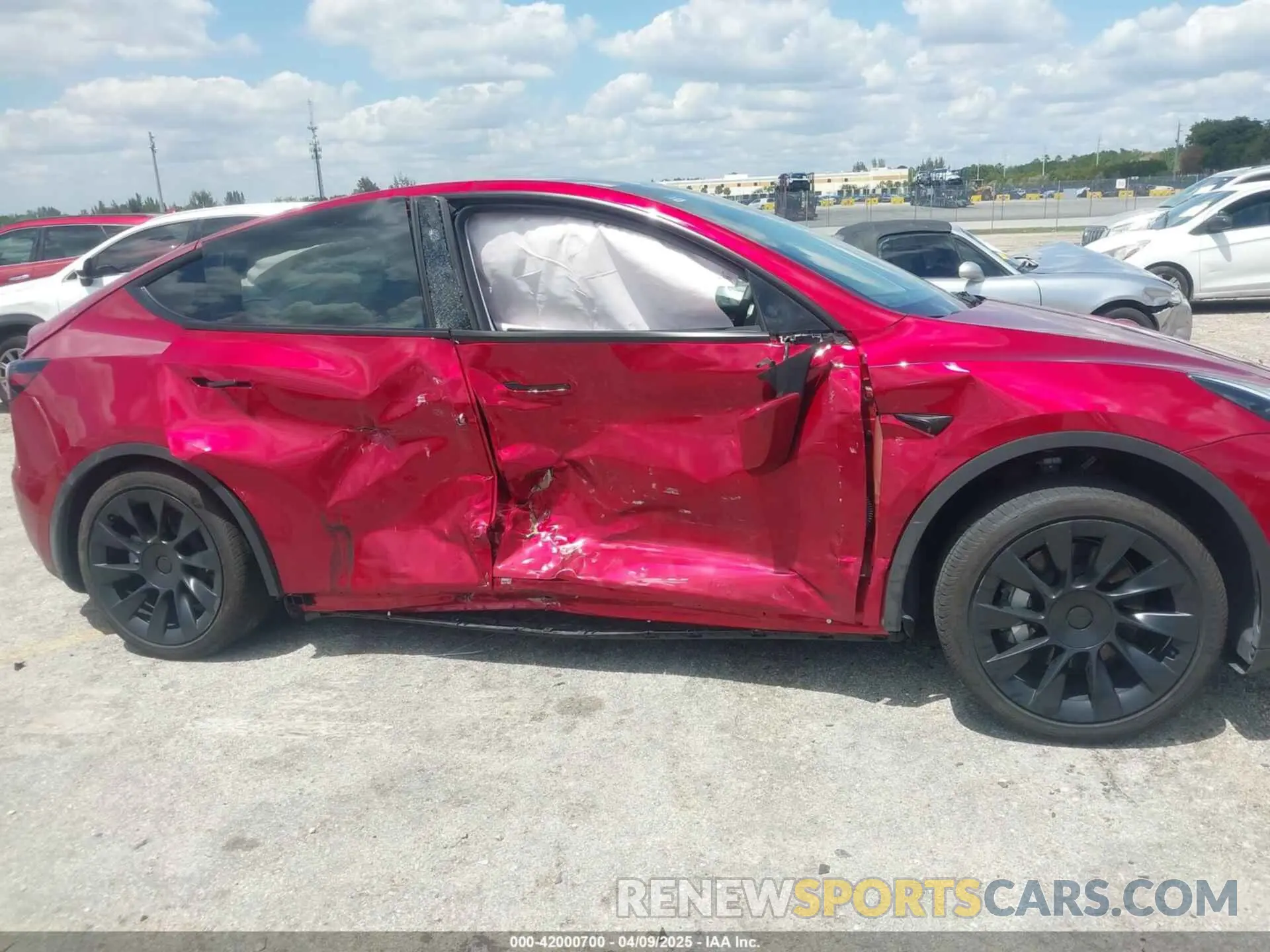 6 Photograph of a damaged car 7SAYGDED7RF045410 TESLA MODEL Y 2024
