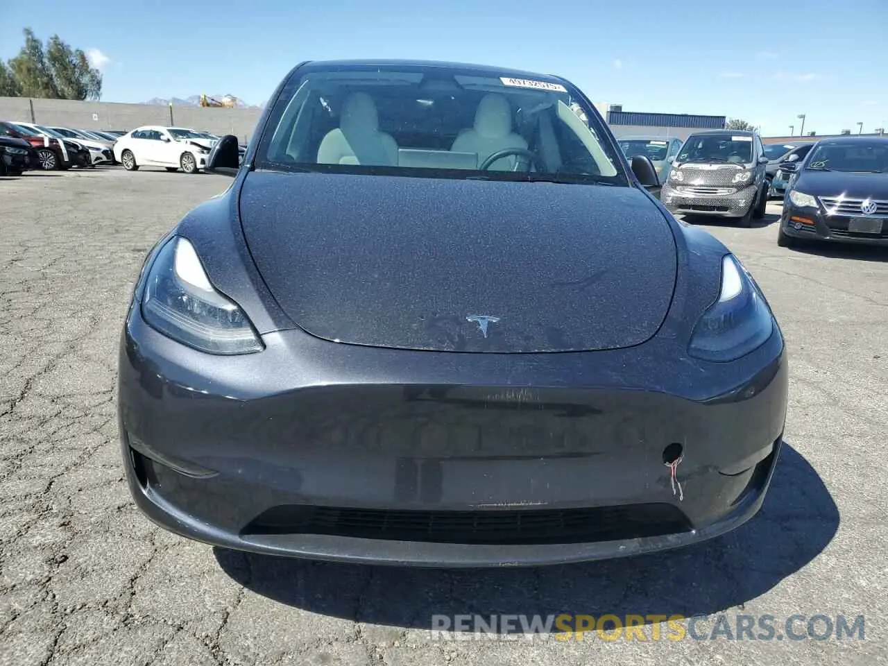 5 Photograph of a damaged car 7SAYGDED8RF023965 TESLA MODEL Y 2024