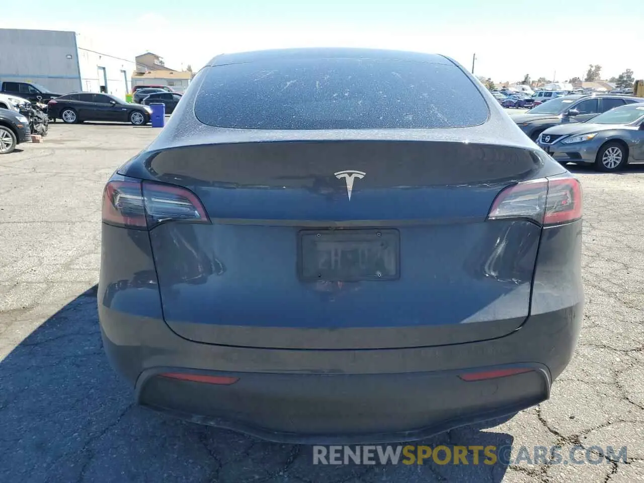 6 Photograph of a damaged car 7SAYGDED8RF023965 TESLA MODEL Y 2024