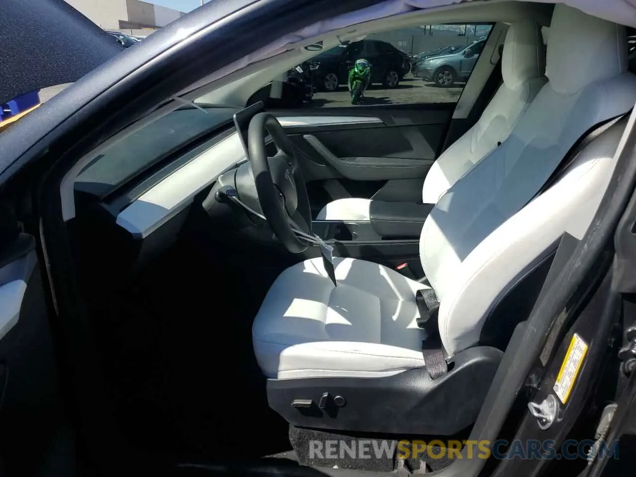 7 Photograph of a damaged car 7SAYGDED8RF023965 TESLA MODEL Y 2024