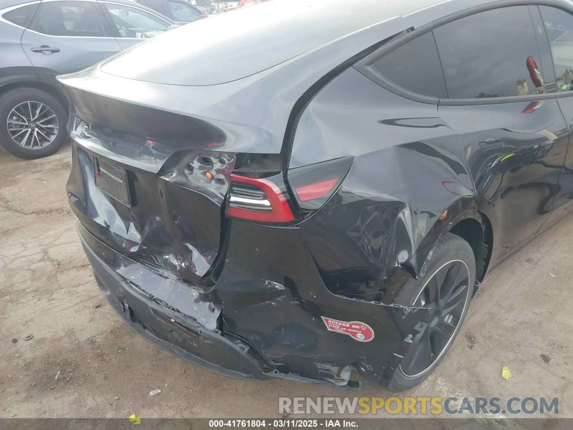 6 Photograph of a damaged car 7SAYGDED8RF116209 TESLA MODEL Y 2024