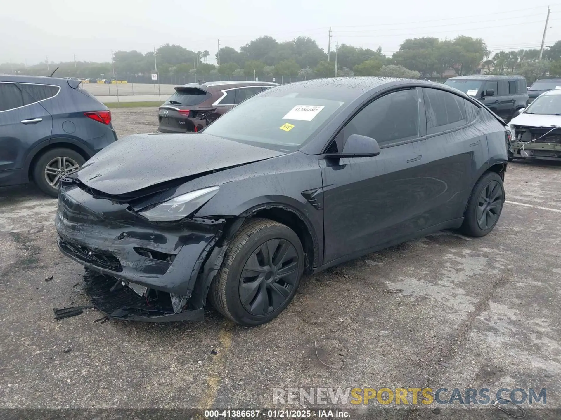 2 Photograph of a damaged car 7SAYGDED8RF213927 TESLA MODEL Y 2024