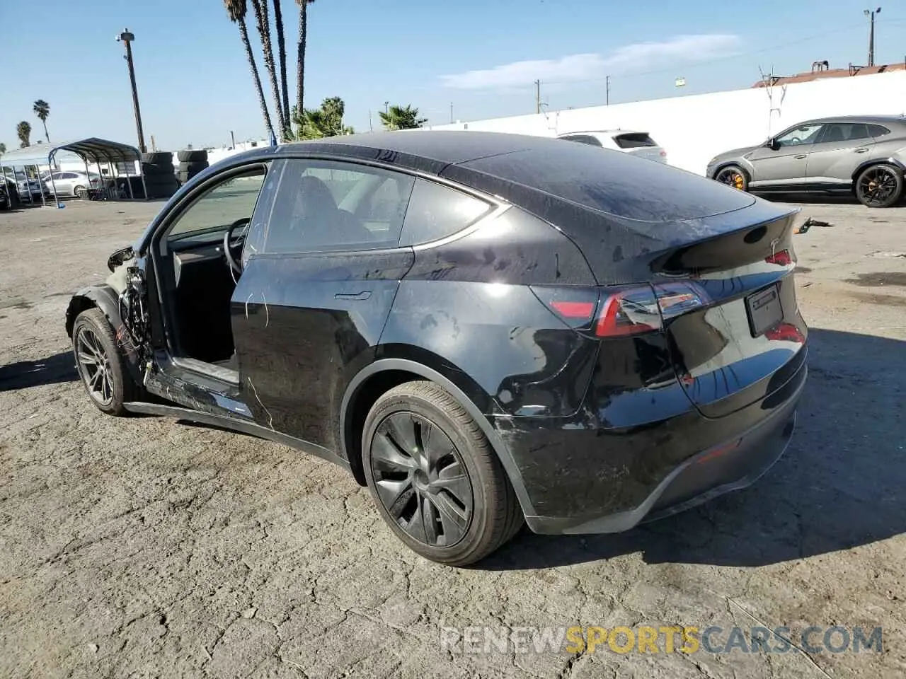 2 Photograph of a damaged car 7SAYGDEE0RA291527 TESLA MODEL Y 2024
