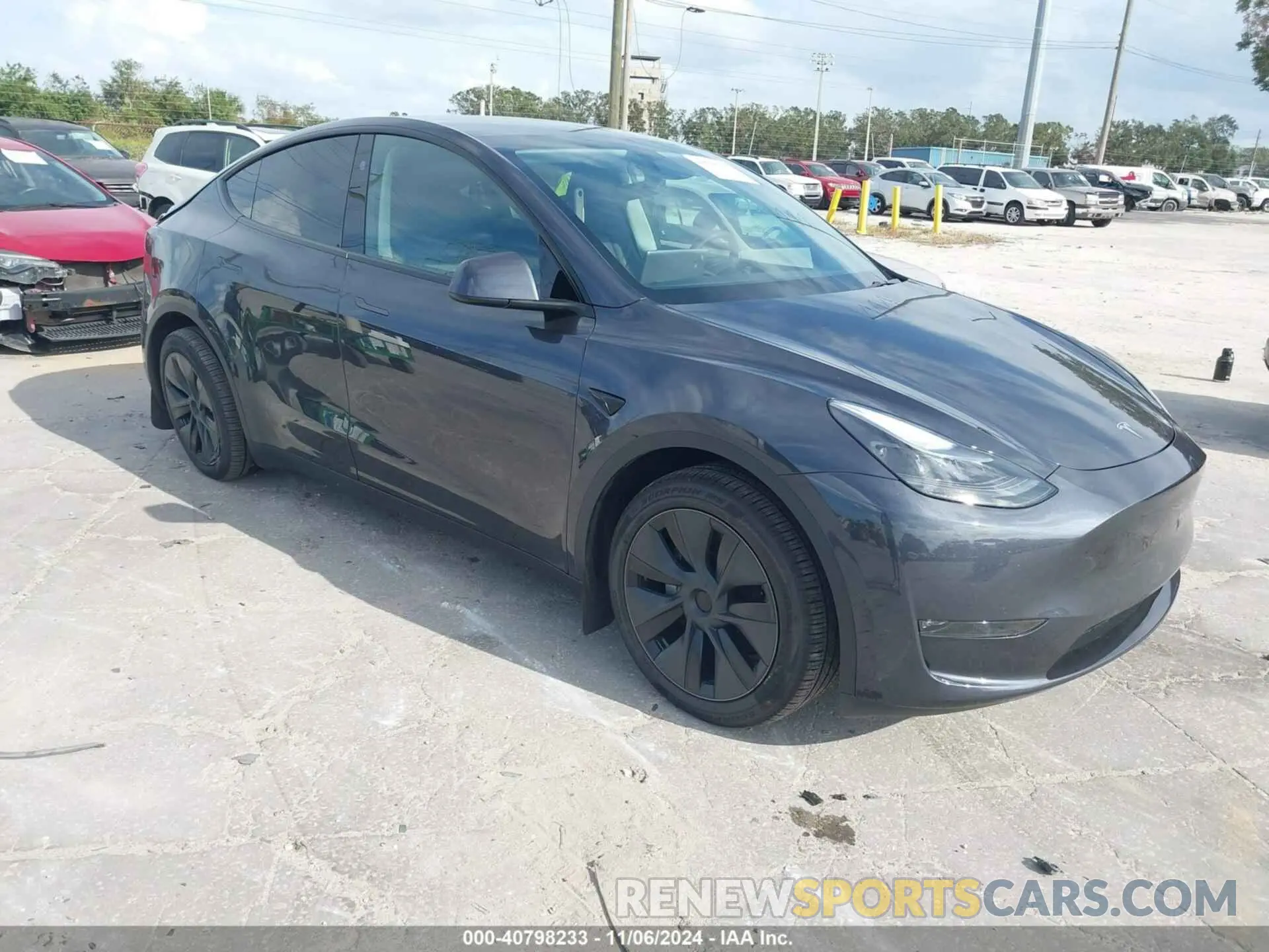 1 Photograph of a damaged car 7SAYGDEE0RA309055 TESLA MODEL Y 2024