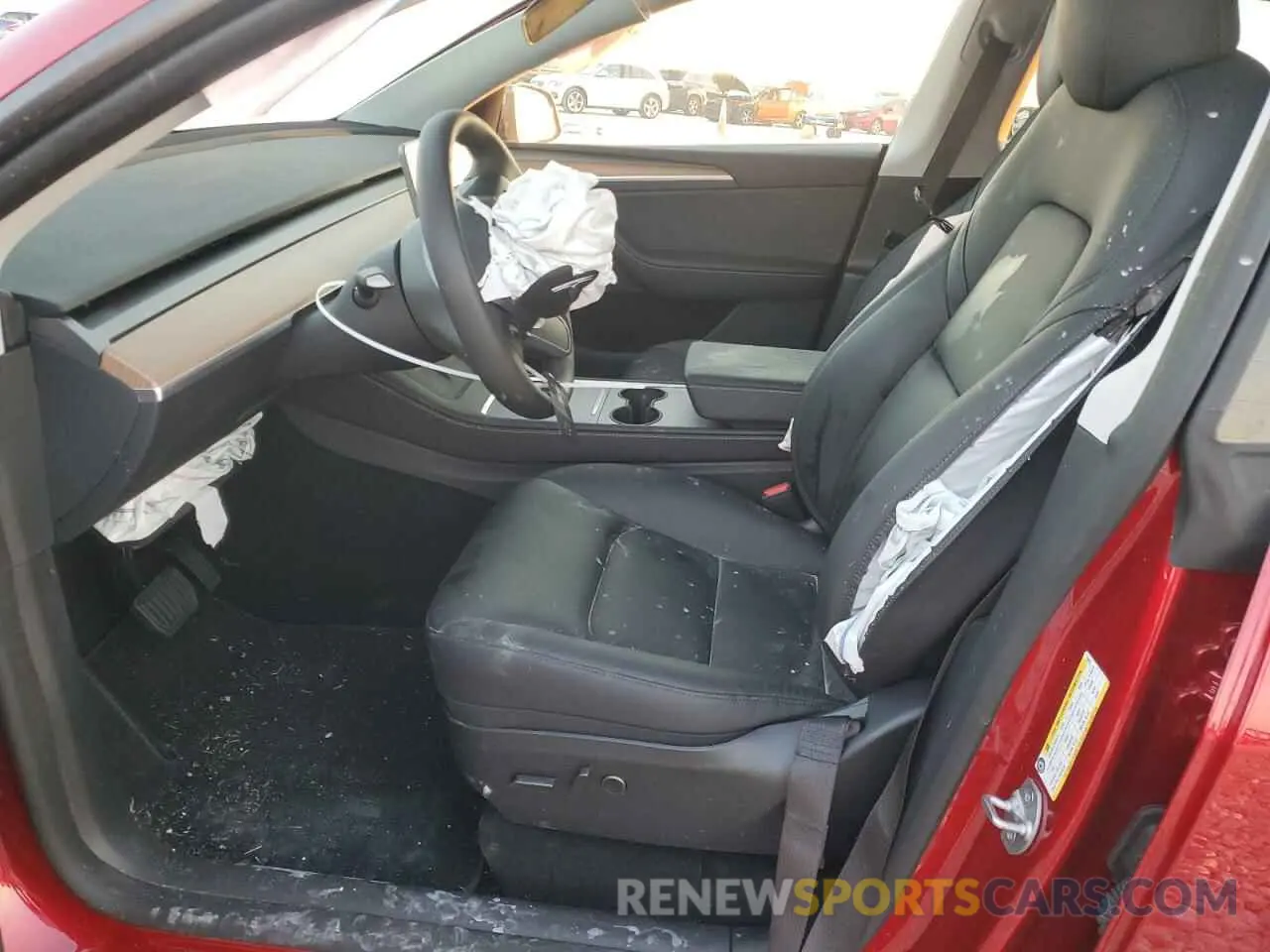 7 Photograph of a damaged car 7SAYGDEE1RA250727 TESLA MODEL Y 2024