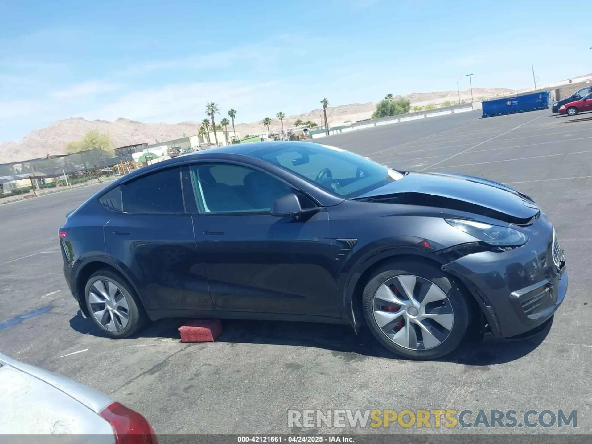 12 Photograph of a damaged car 7SAYGDEE1RF067024 TESLA MODEL Y 2024