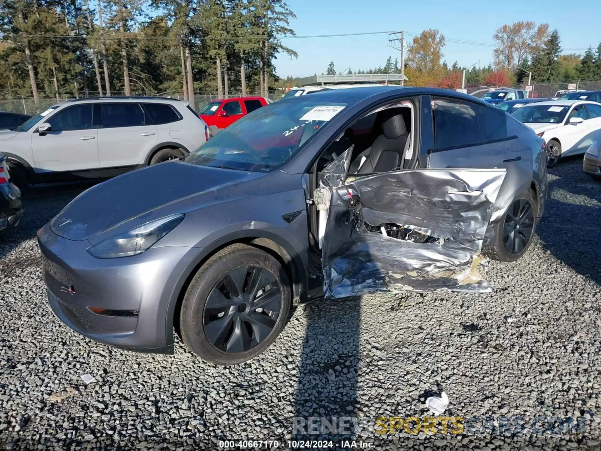 2 Photograph of a damaged car 7SAYGDEE1RF200705 TESLA MODEL Y 2024