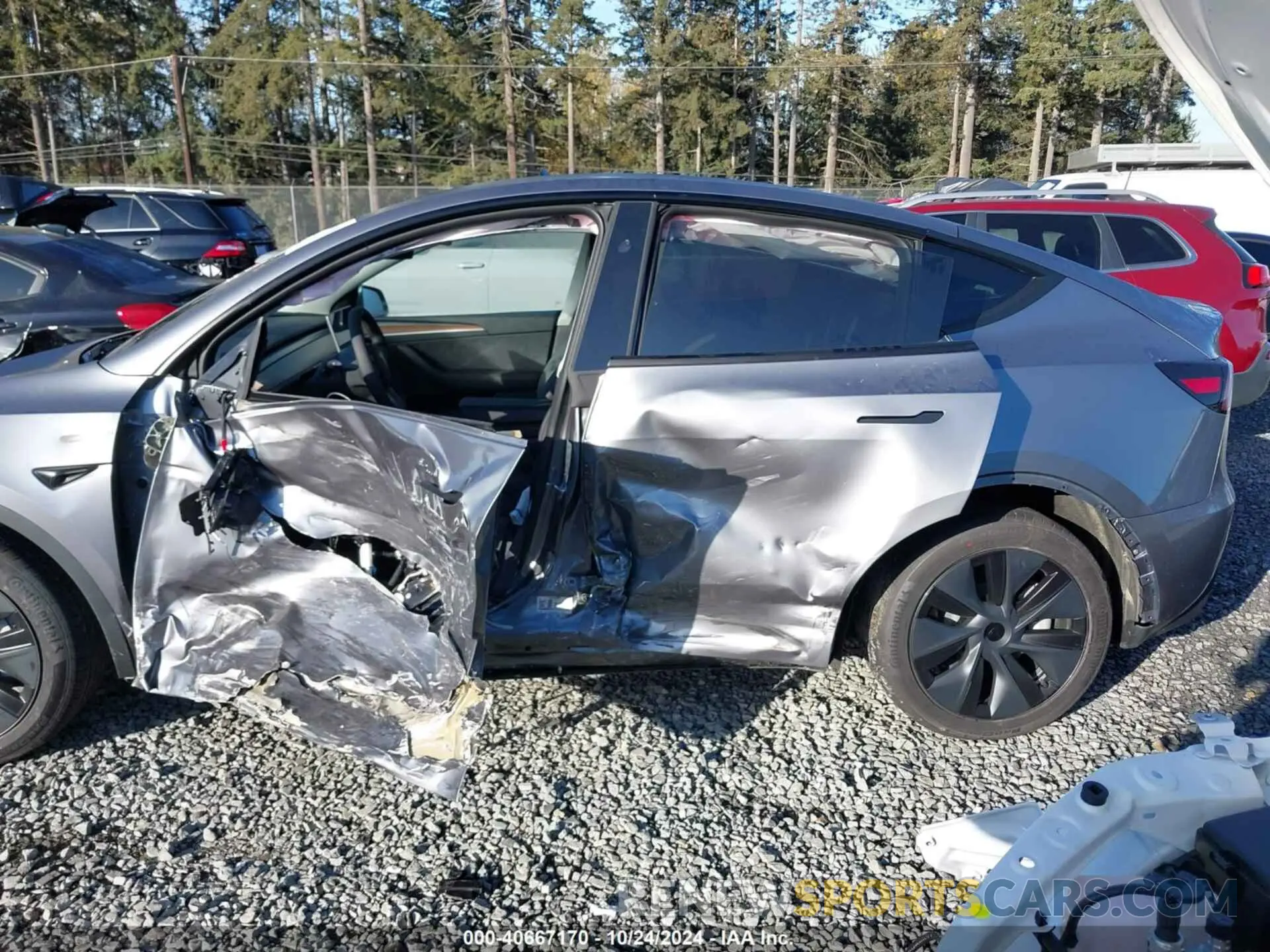 6 Photograph of a damaged car 7SAYGDEE1RF200705 TESLA MODEL Y 2024
