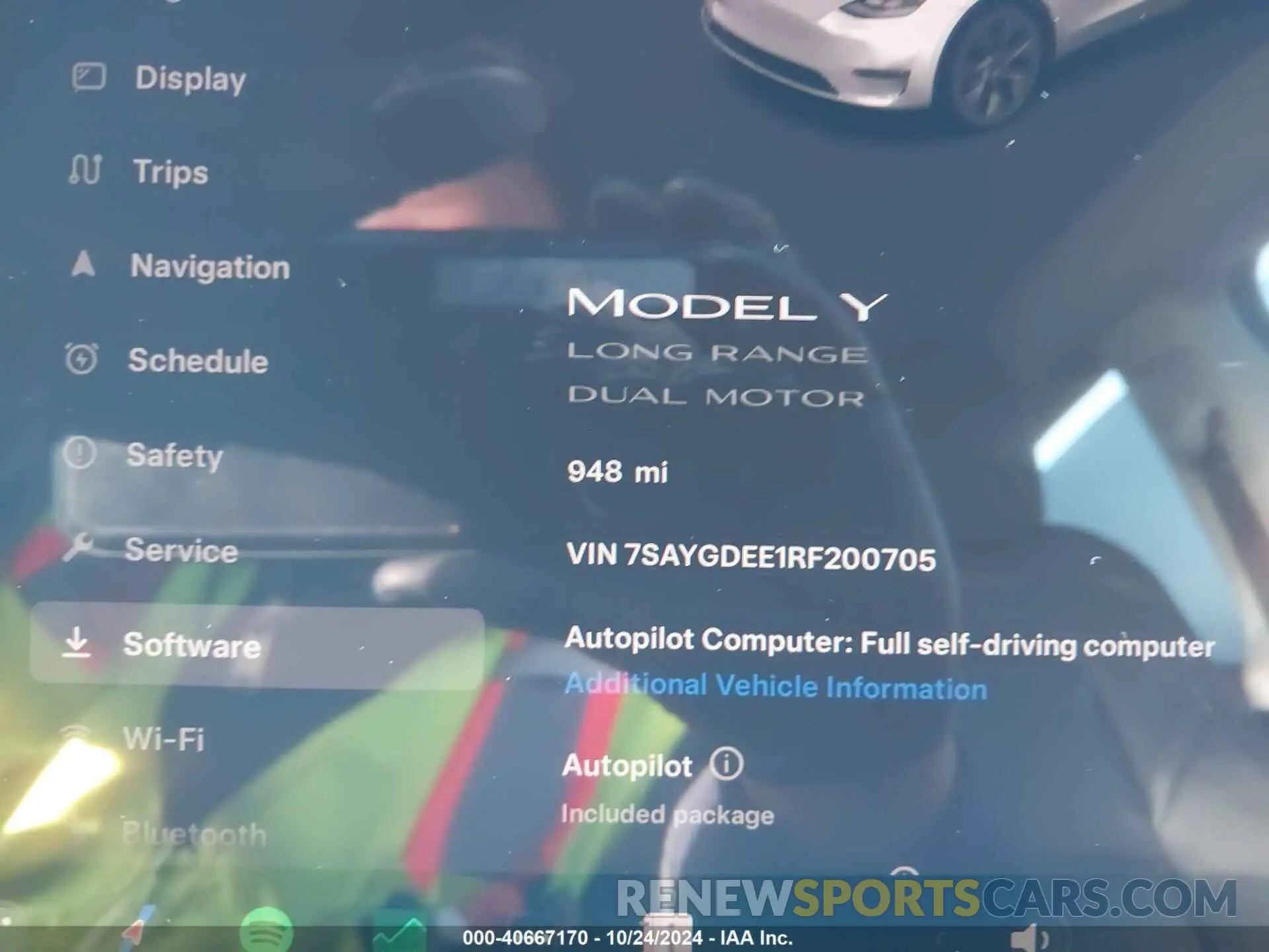 7 Photograph of a damaged car 7SAYGDEE1RF200705 TESLA MODEL Y 2024