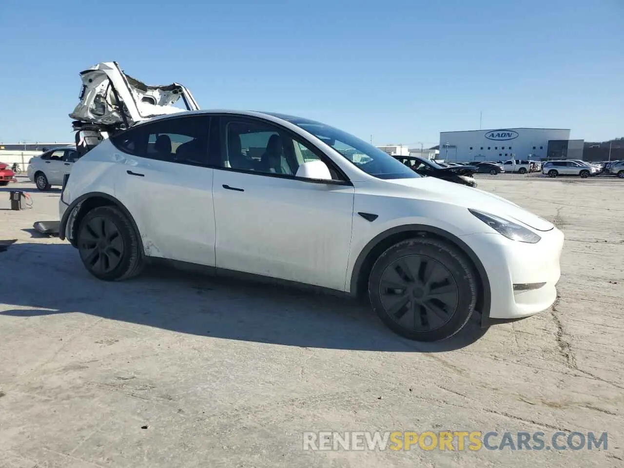 4 Photograph of a damaged car 7SAYGDEE1RF212496 TESLA MODEL Y 2024