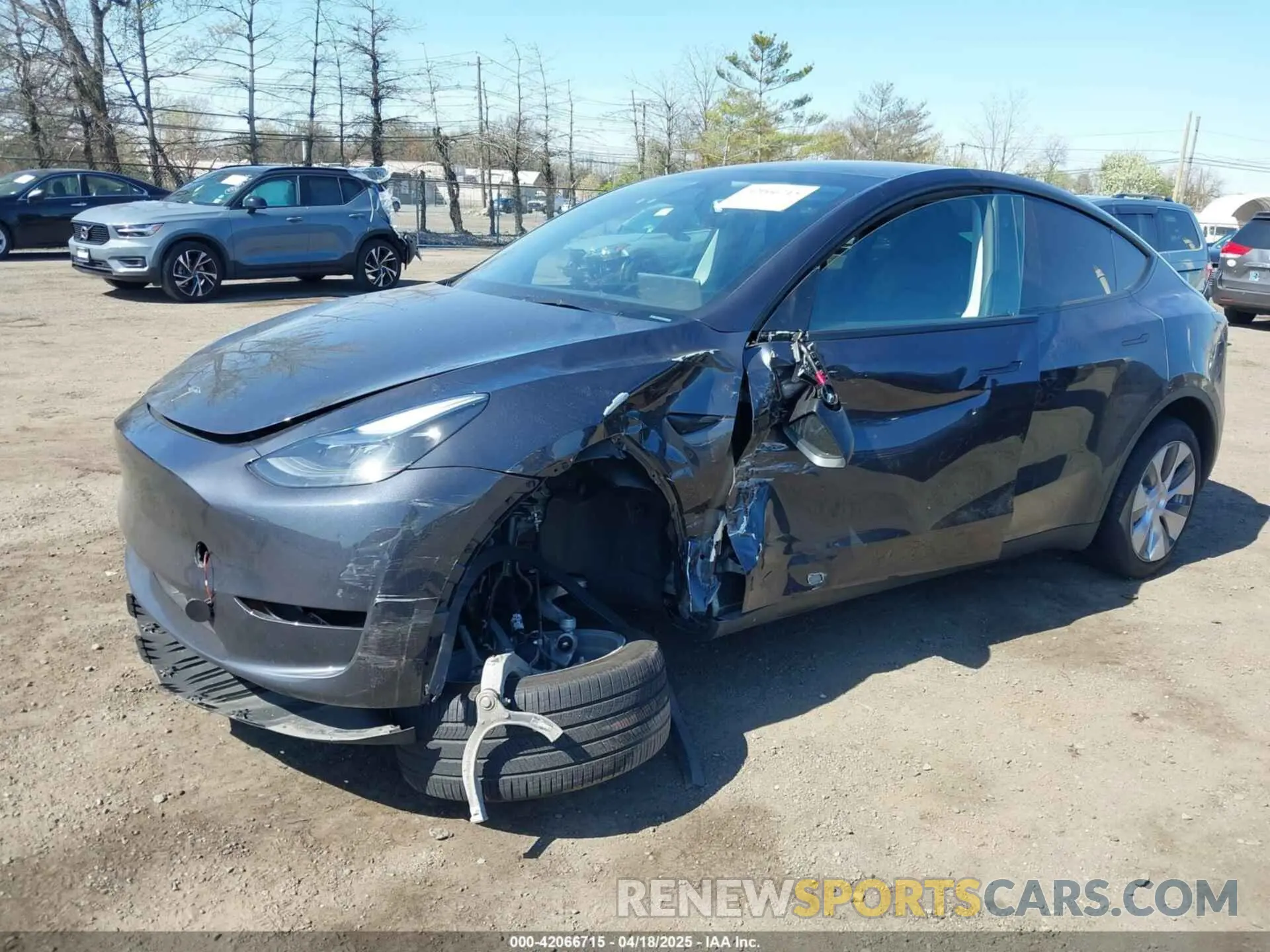 6 Photograph of a damaged car 7SAYGDEE2RA281016 TESLA MODEL Y 2024
