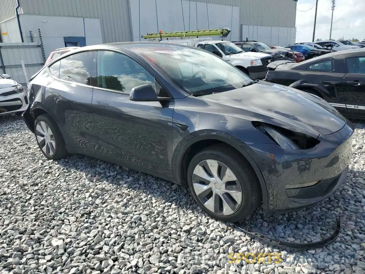 4 Photograph of a damaged car 7SAYGDEE3RA249434 TESLA MODEL Y 2024