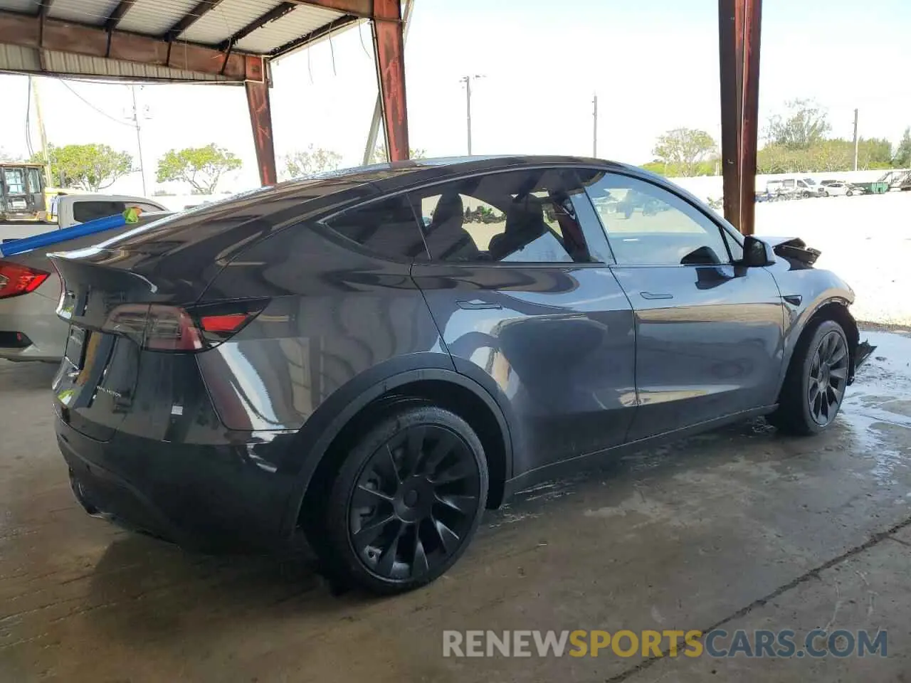 3 Photograph of a damaged car 7SAYGDEE3RA280814 TESLA MODEL Y 2024