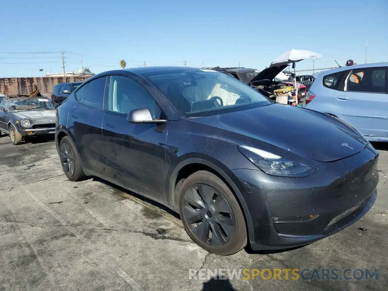 4 Photograph of a damaged car 7SAYGDEE3RF126848 TESLA MODEL Y 2024