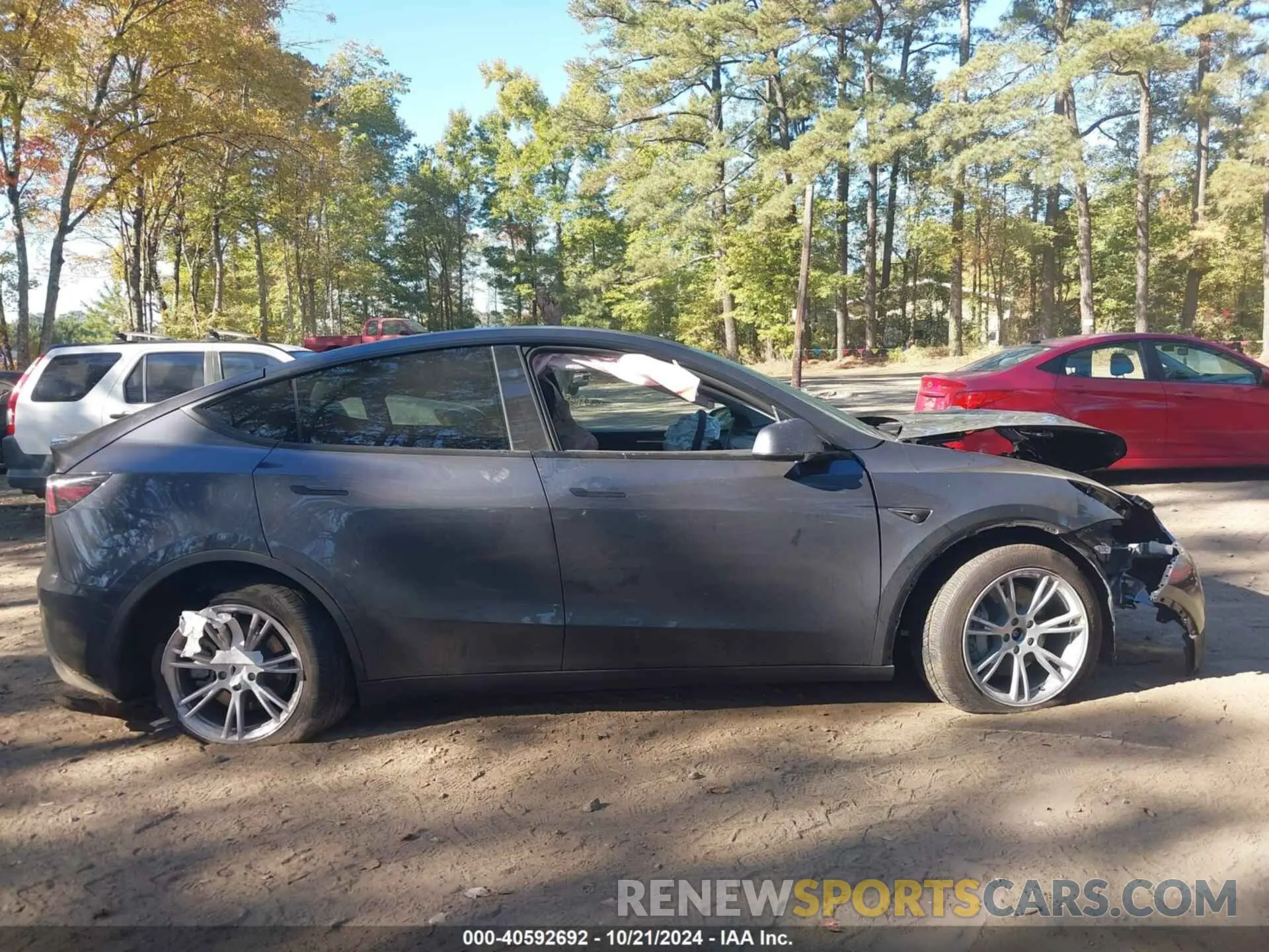 12 Photograph of a damaged car 7SAYGDEE5RA245983 TESLA MODEL Y 2024