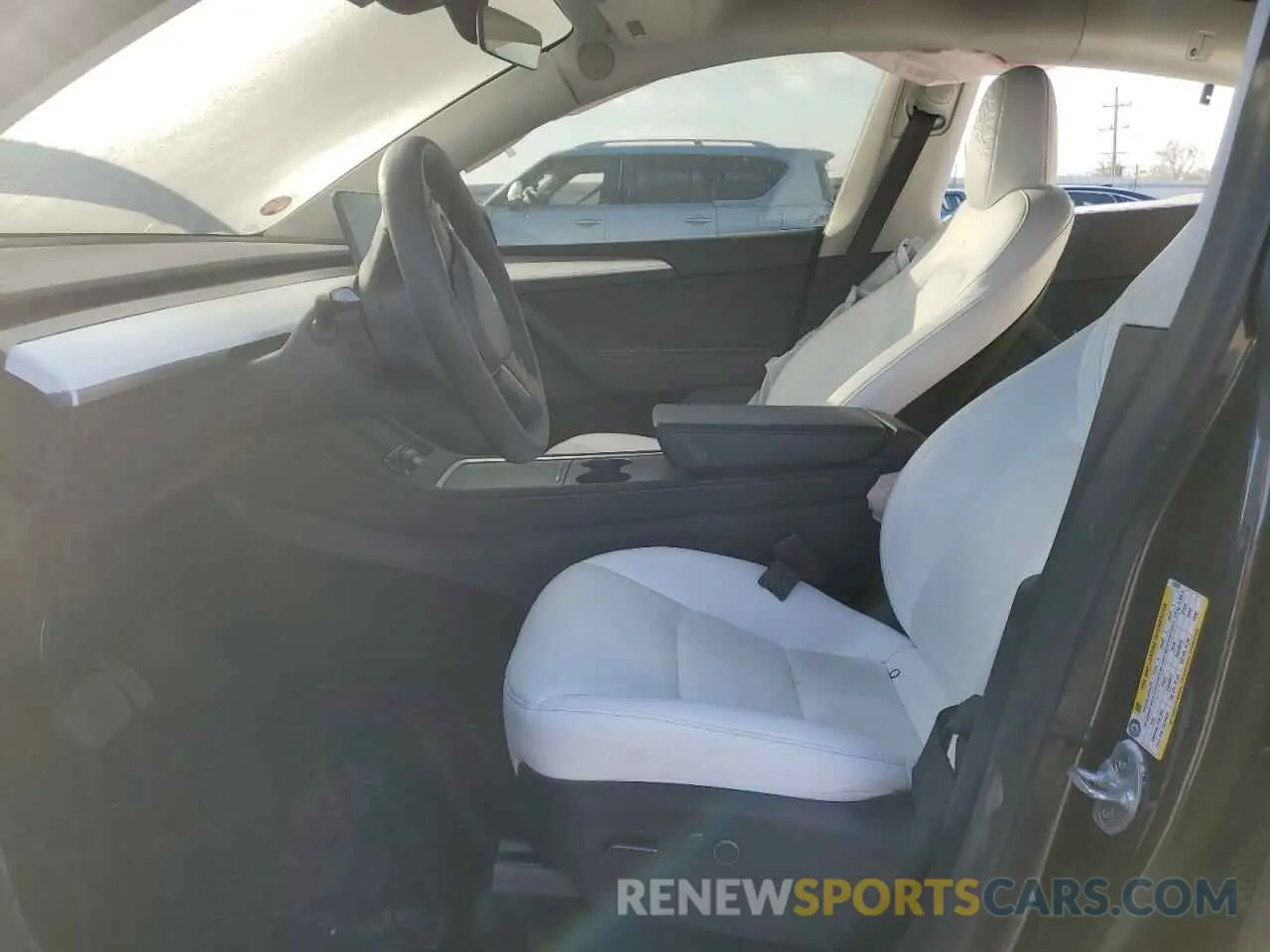 7 Photograph of a damaged car 7SAYGDEE6RF152828 TESLA MODEL Y 2024