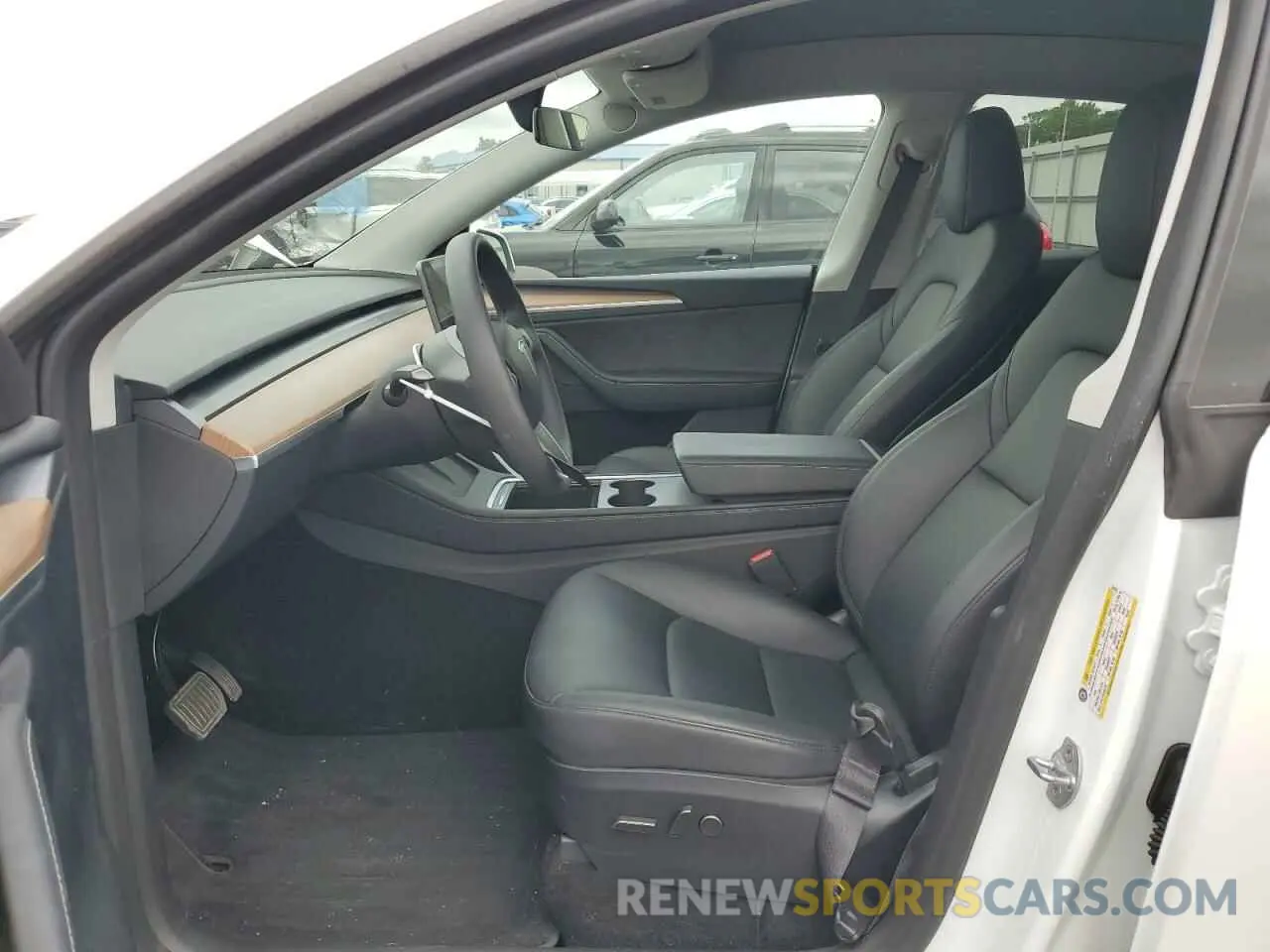 7 Photograph of a damaged car 7SAYGDEE7RA251624 TESLA MODEL Y 2024