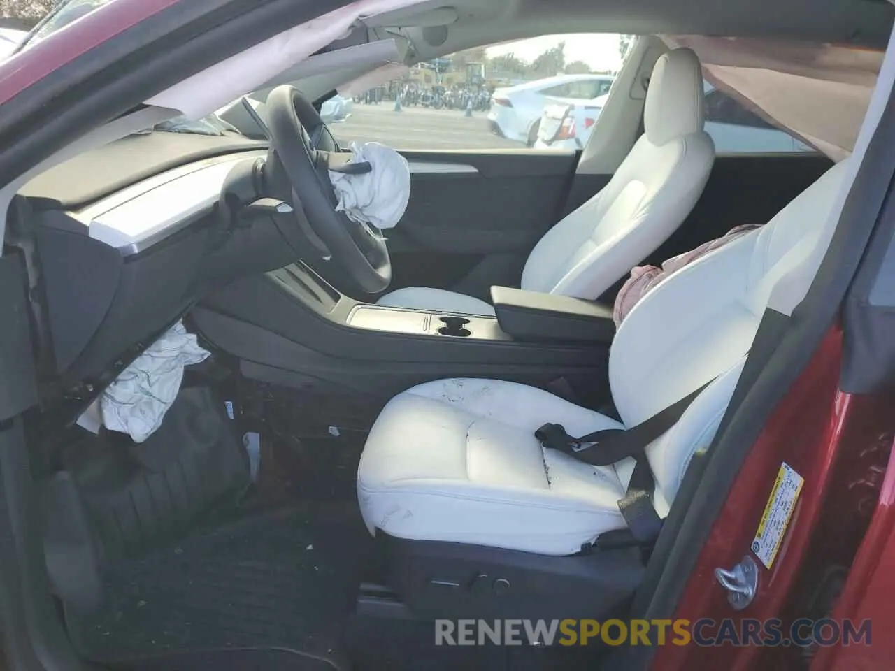 7 Photograph of a damaged car 7SAYGDEE7RF009984 TESLA MODEL Y 2024