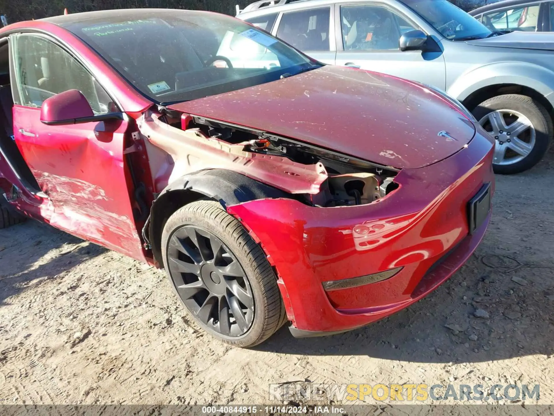 6 Photograph of a damaged car 7SAYGDEE7RF076522 TESLA MODEL Y 2024
