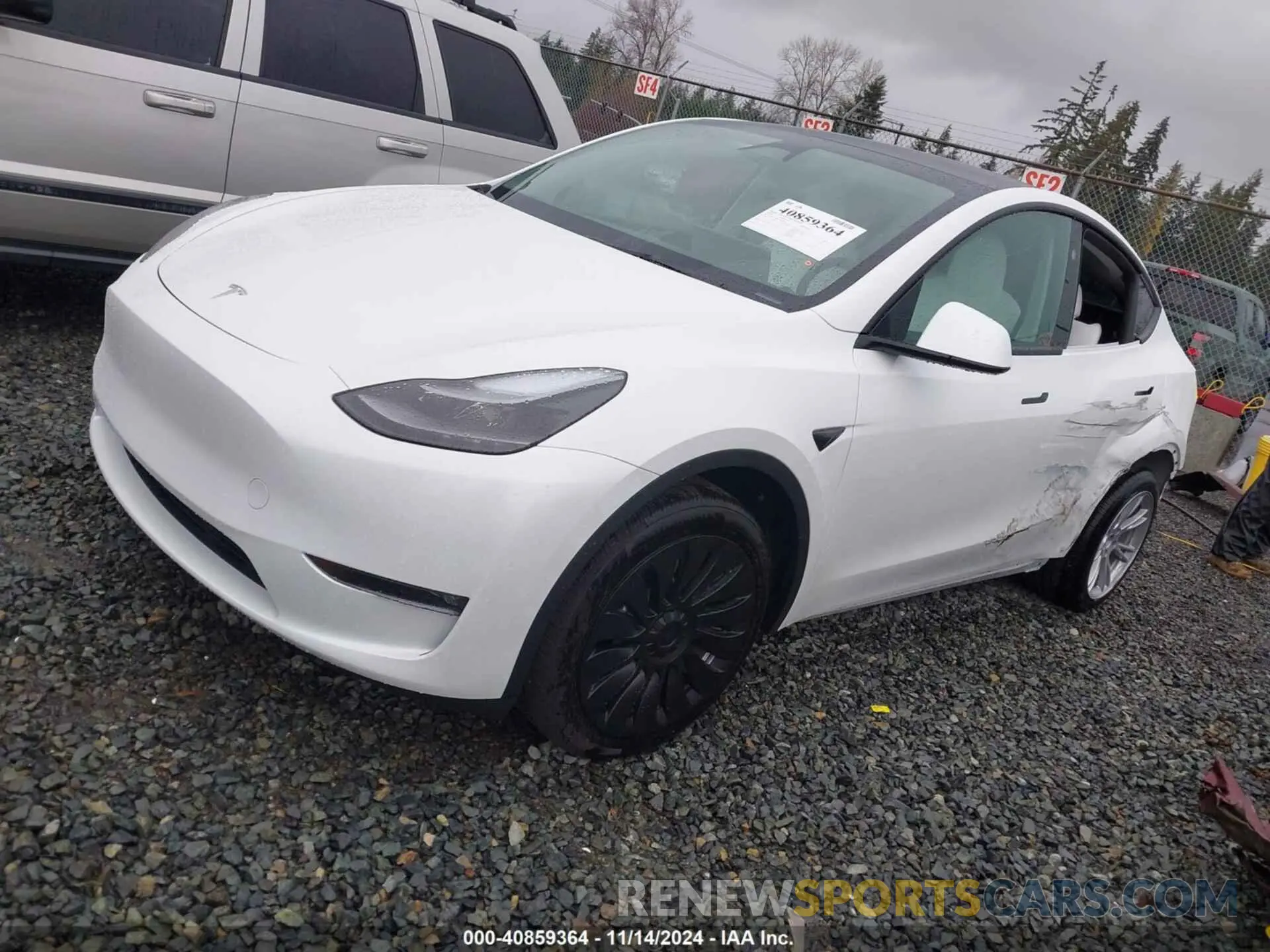 2 Photograph of a damaged car 7SAYGDEE7RF083700 TESLA MODEL Y 2024