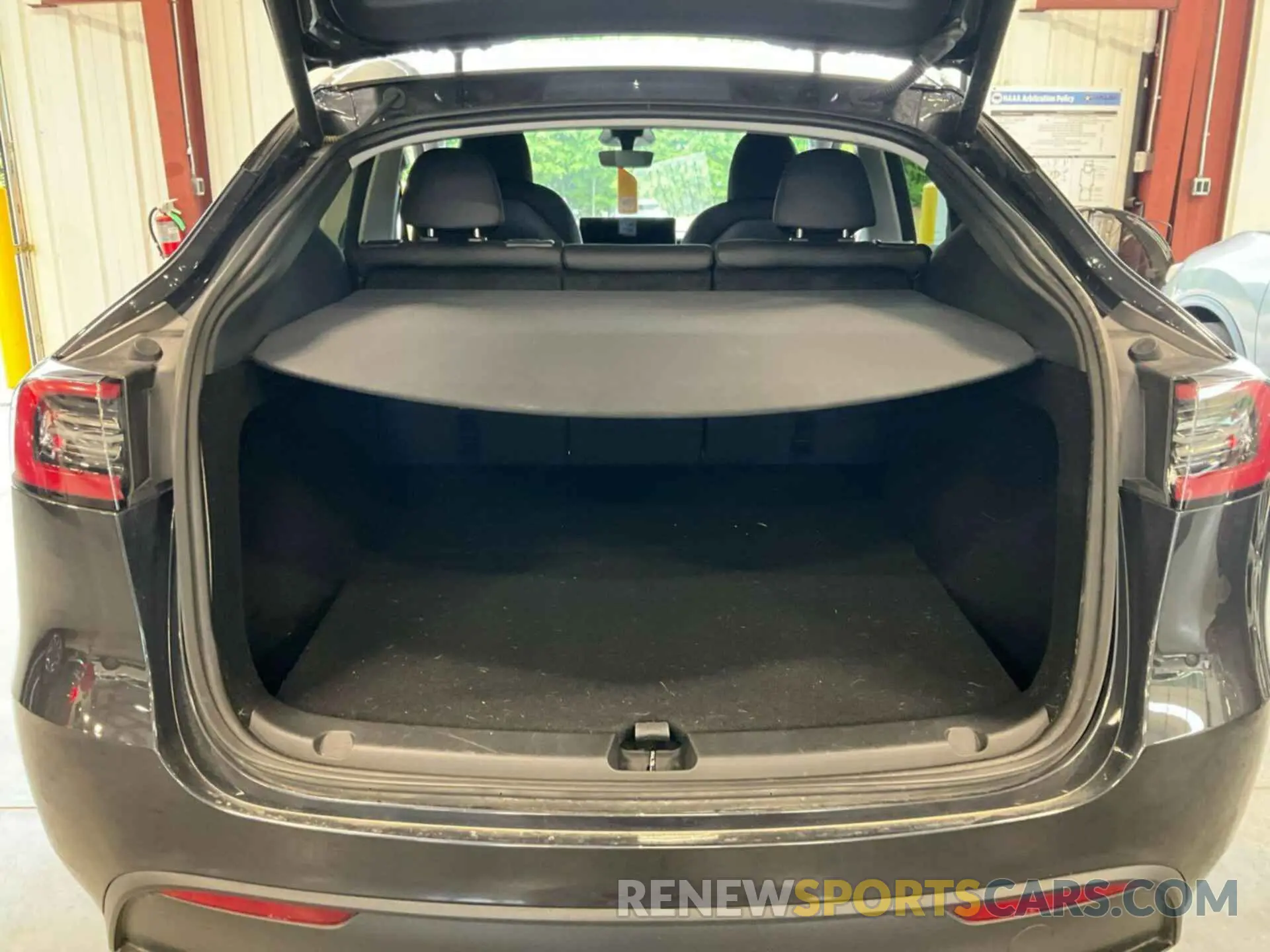 19 Photograph of a damaged car 7SAYGDEE8RF986468 TESLA MODEL Y 2024