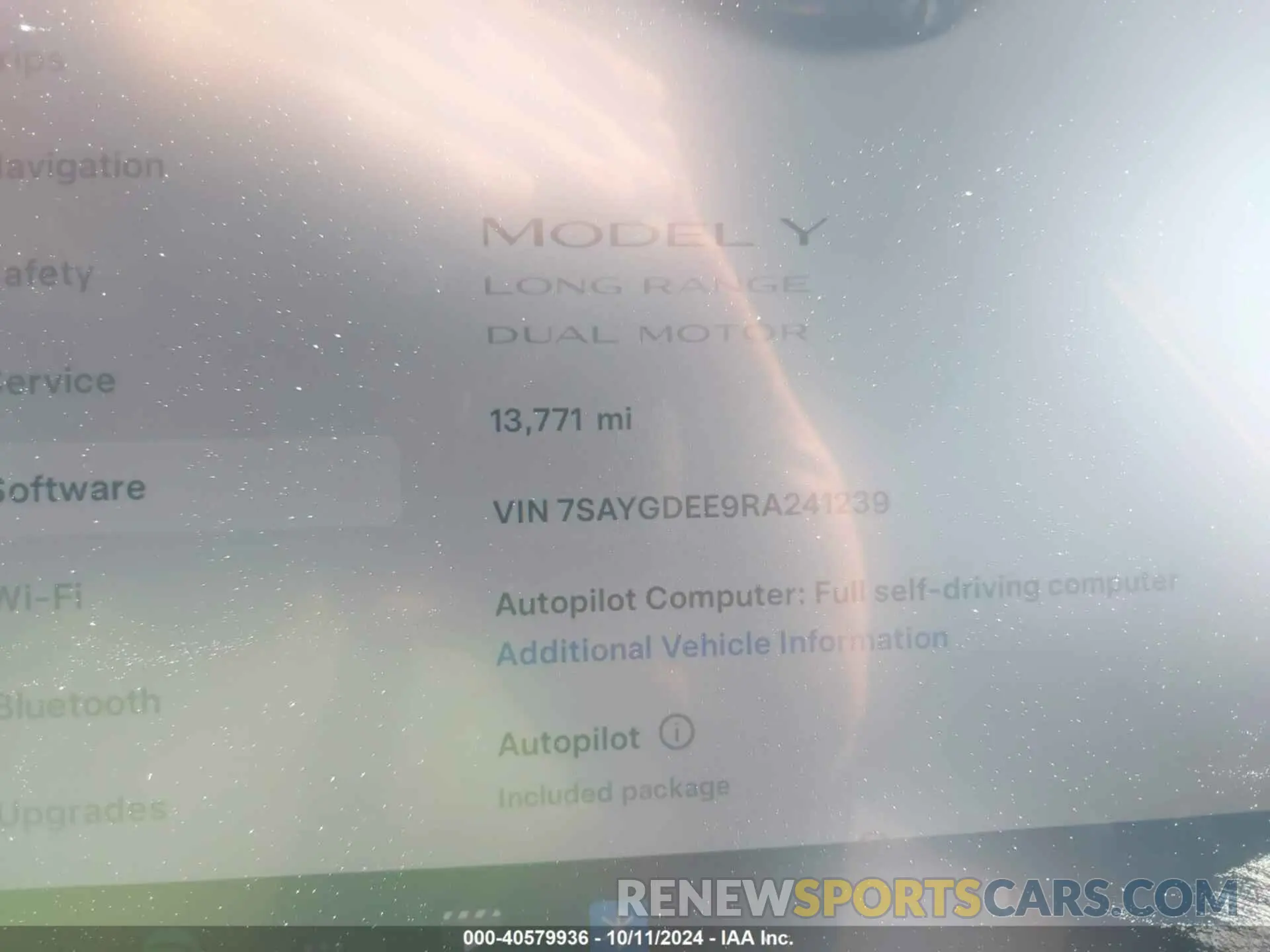 7 Photograph of a damaged car 7SAYGDEE9RA241239 TESLA MODEL Y 2024