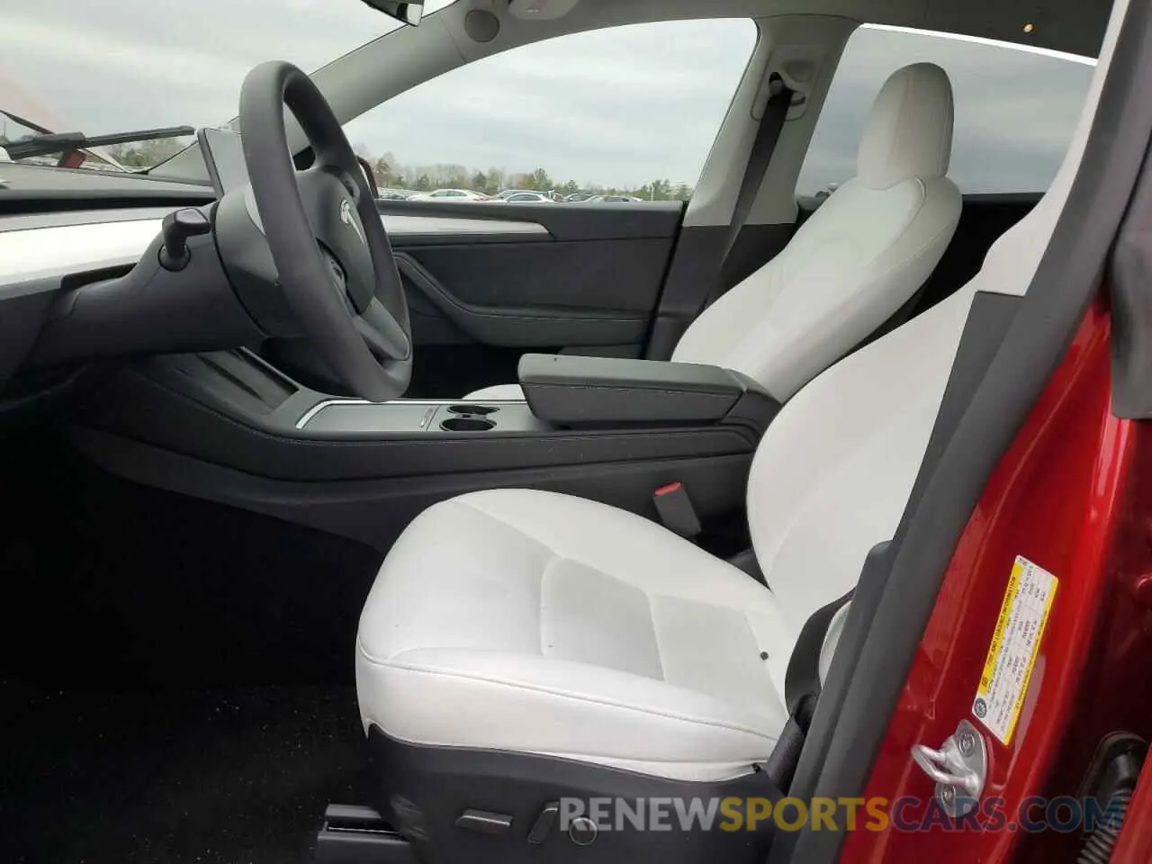 7 Photograph of a damaged car 7SAYGDEE9RA291543 TESLA MODEL Y 2024