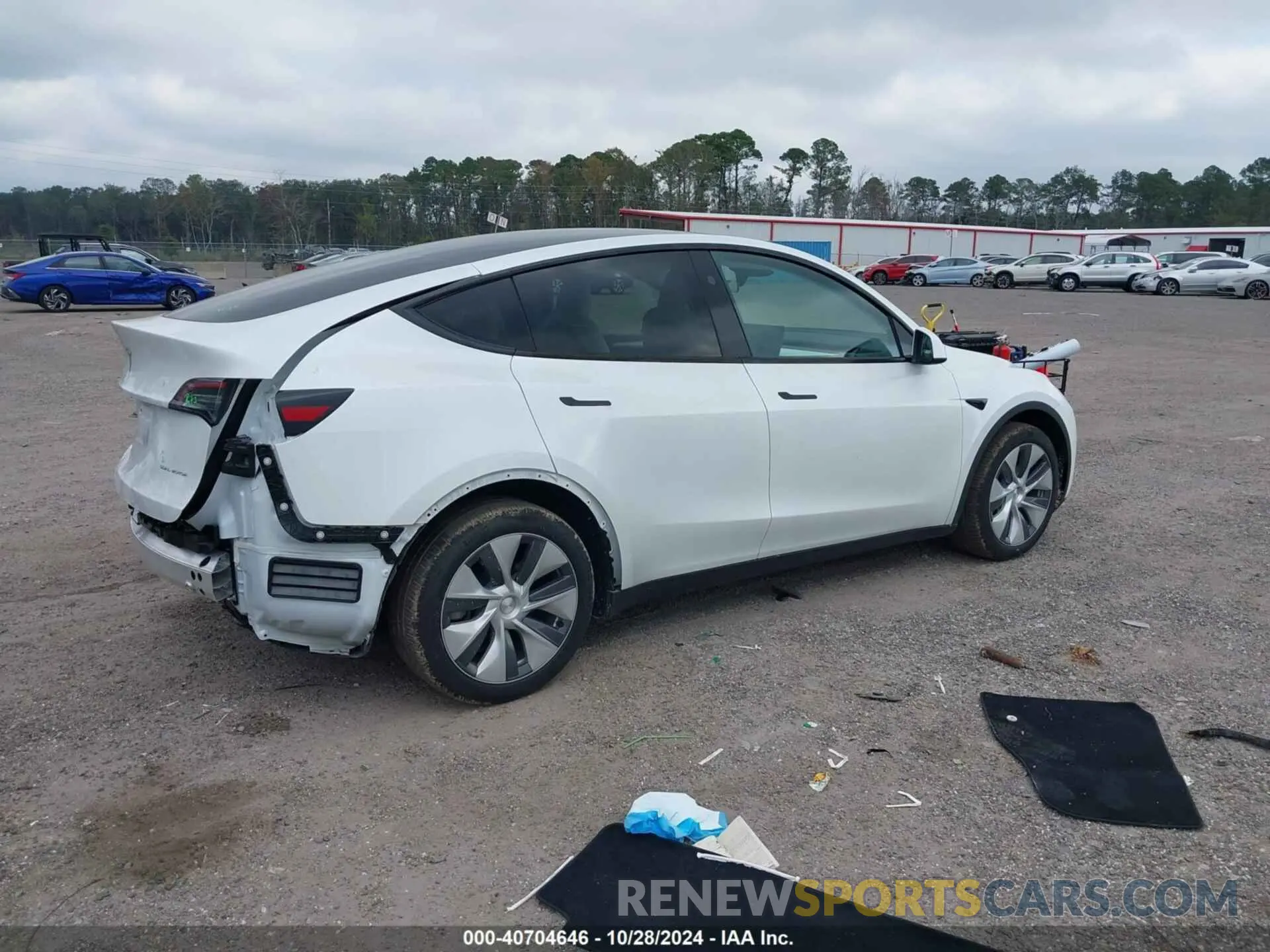 4 Photograph of a damaged car 7SAYGDEEXRA269597 TESLA MODEL Y 2024