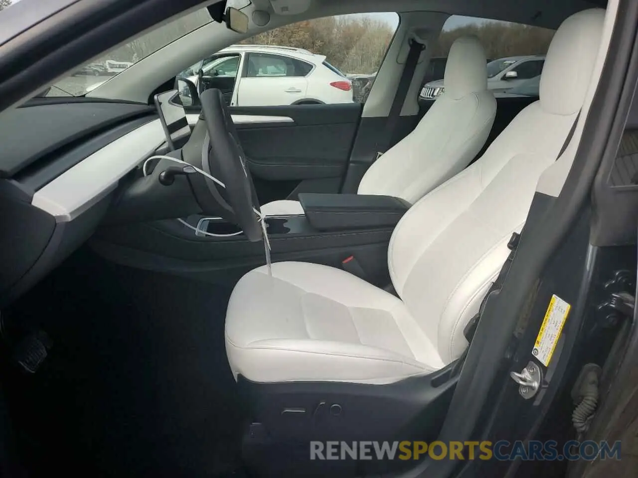7 Photograph of a damaged car 7SAYGDEEXRA279594 TESLA MODEL Y 2024