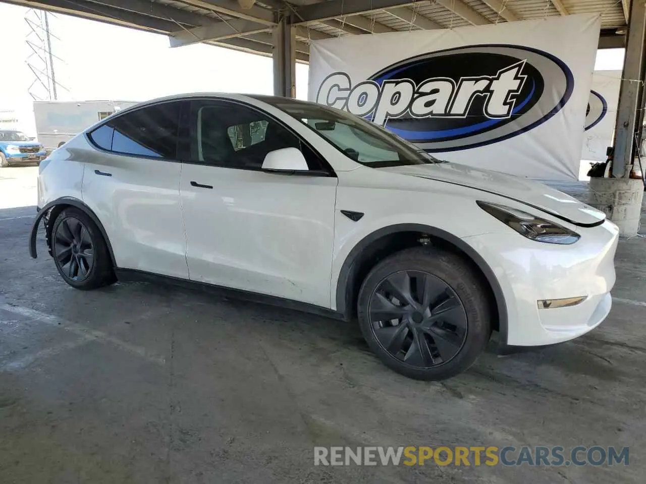 4 Photograph of a damaged car 7SAYGDEEXRF122859 TESLA MODEL Y 2024
