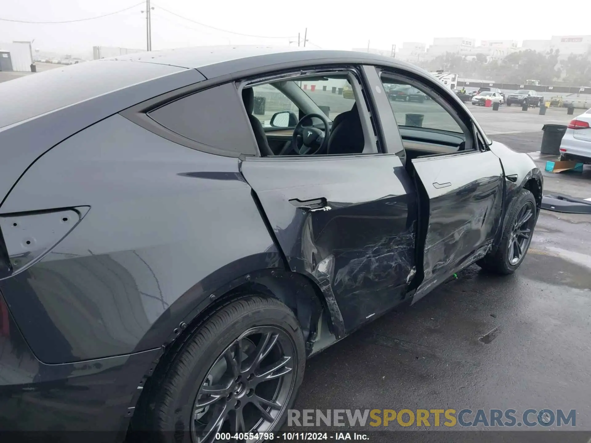 6 Photograph of a damaged car 7SAYGDEEXRF180731 TESLA MODEL Y 2024
