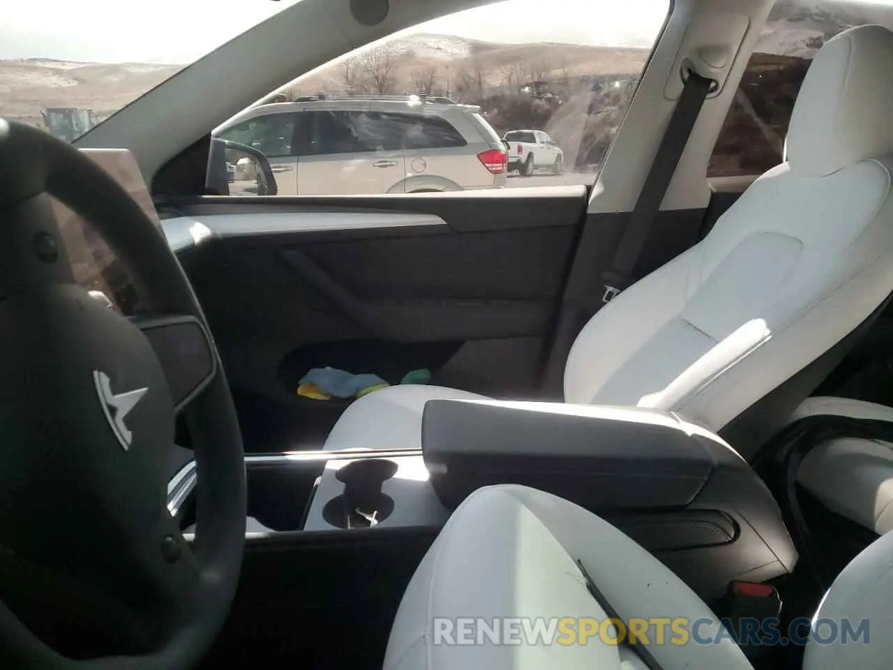 7 Photograph of a damaged car 7SAYGDEF6RF166365 TESLA MODEL Y 2024