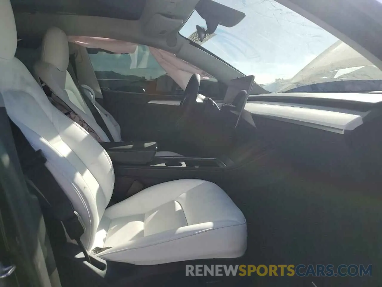 7 Photograph of a damaged car 7SAYGDEF9RF130637 TESLA MODEL Y 2024