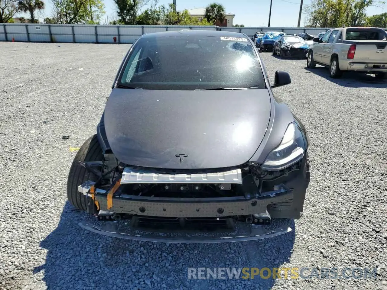 5 Photograph of a damaged car 7SAYGDEFXRA271486 TESLA MODEL Y 2024