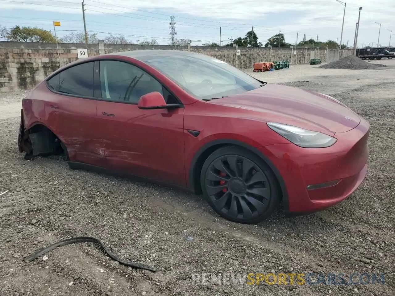 4 Photograph of a damaged car 7SAYGDEFXRF152002 TESLA MODEL Y 2024