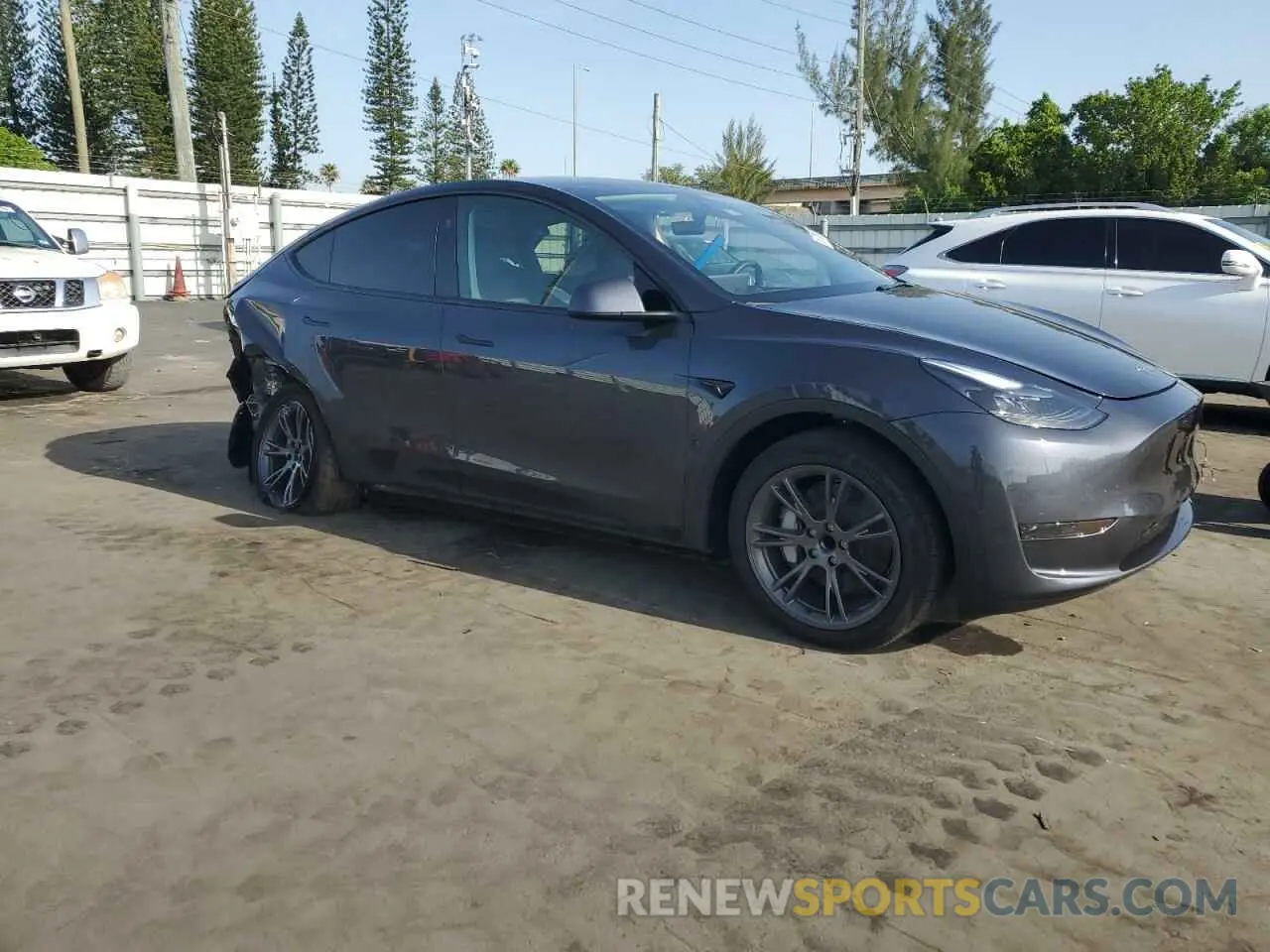 4 Photograph of a damaged car 7SAYGDED2SA374423 TESLA MODEL Y 2025