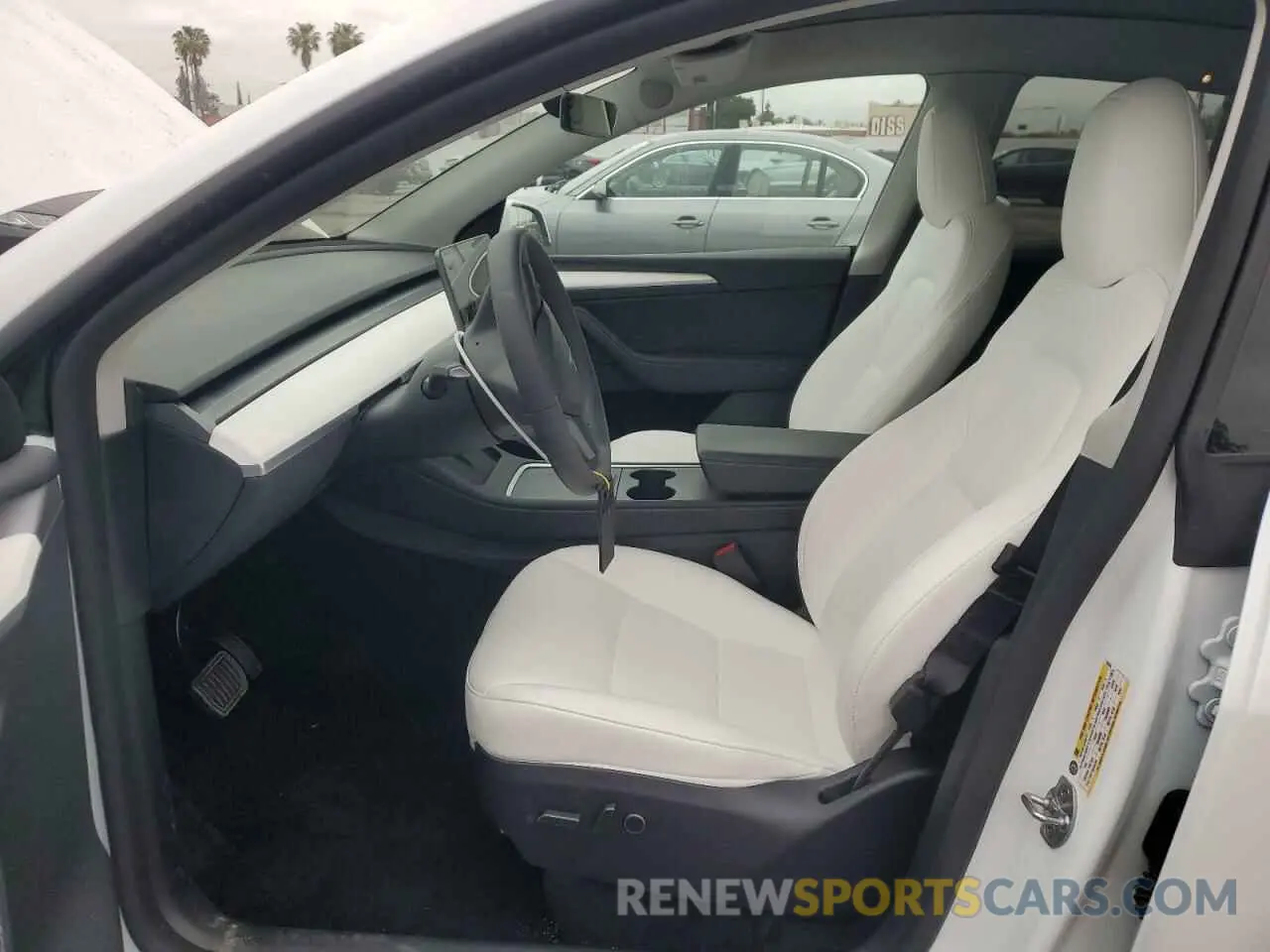 7 Photograph of a damaged car 7SAYGDED5SF228228 TESLA MODEL Y 2025
